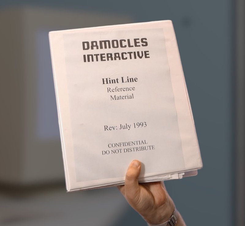 The Compendium in hand